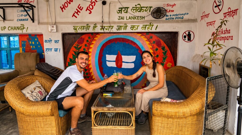 Travelers relaxing at a travel assistance center while receiving local guidance and support during their India trip.